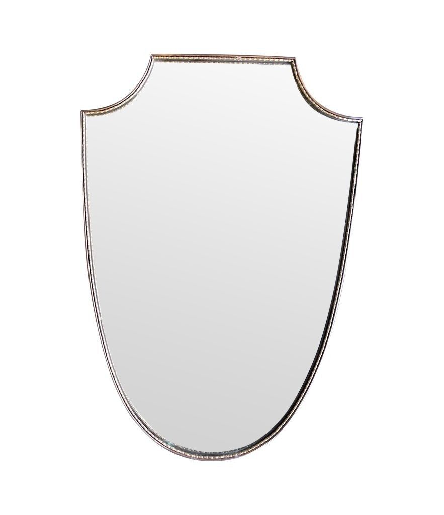 photo furniture An Orignal Italian 1960s Brass Shield Mirror With Beaded Inner Frame Detail