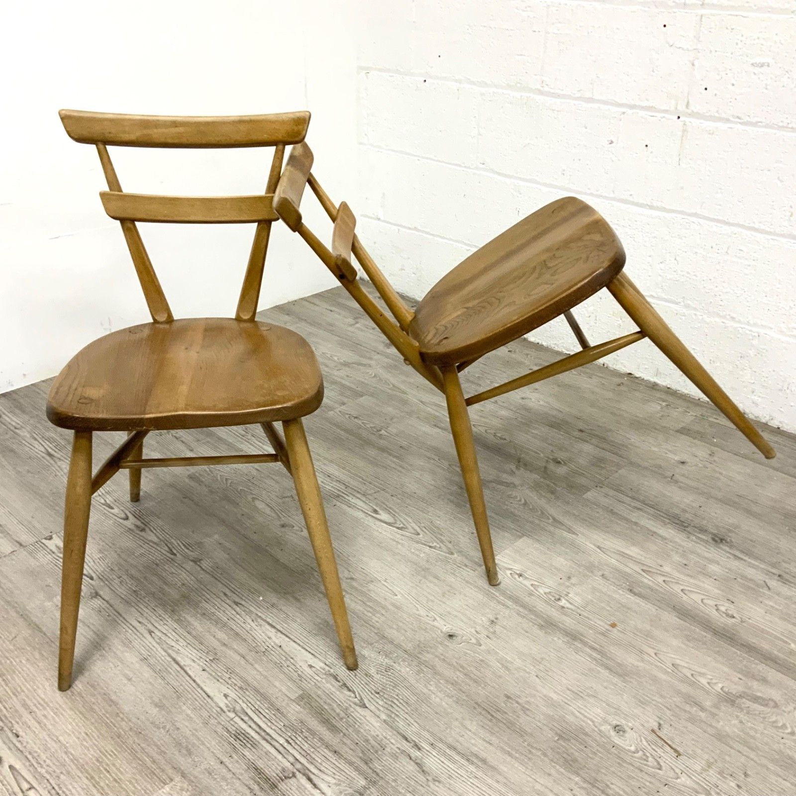 photo buy A Pair Of Ercol Model 461 “Green Dot” Adult Size Stacking Chairs 1960
