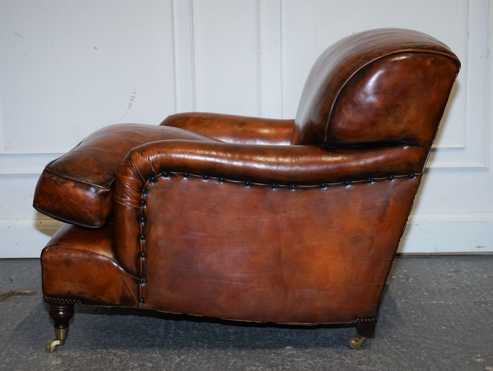 photo vintage Large Pair Of Howard Style Hand Dyed Leather Armchairs Feather Filled Cushions