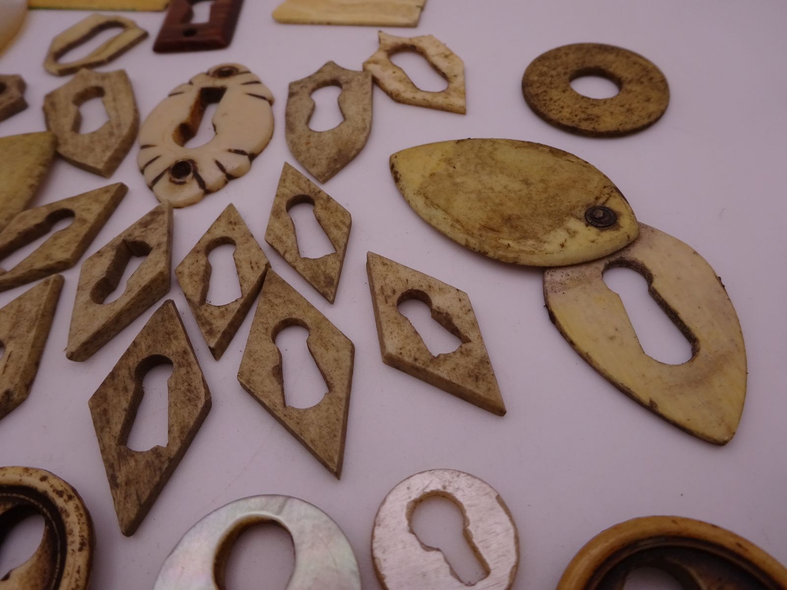 Collection Of Antique Natural Escutcheons For Furniture Restoration photo Furniture