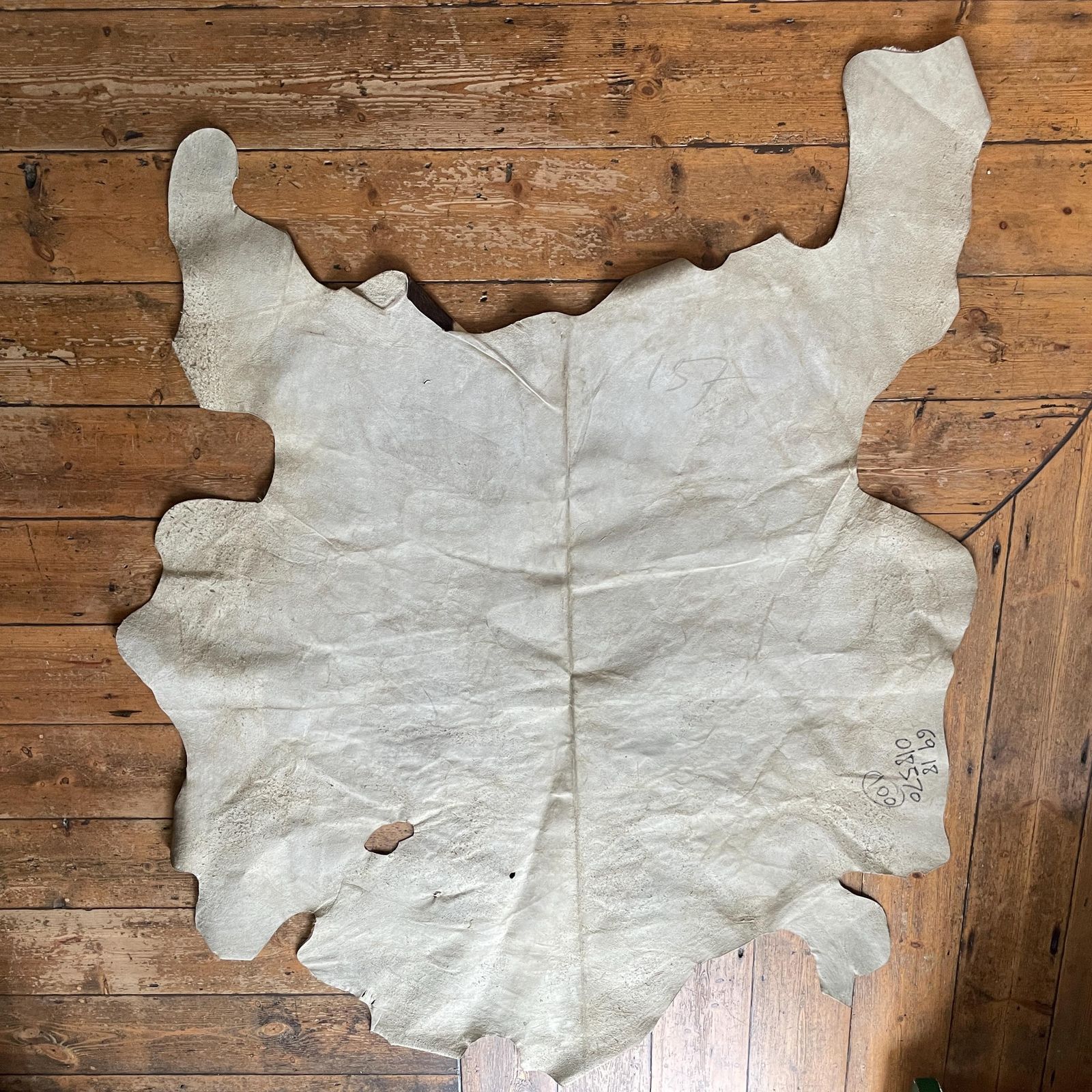 125.0 Natural Brown White Cowhide Rug Genuine Leather Unusual Shape Farmhouse Rustic Boho Western Style Floor Mat Large Hide Home Accent photo