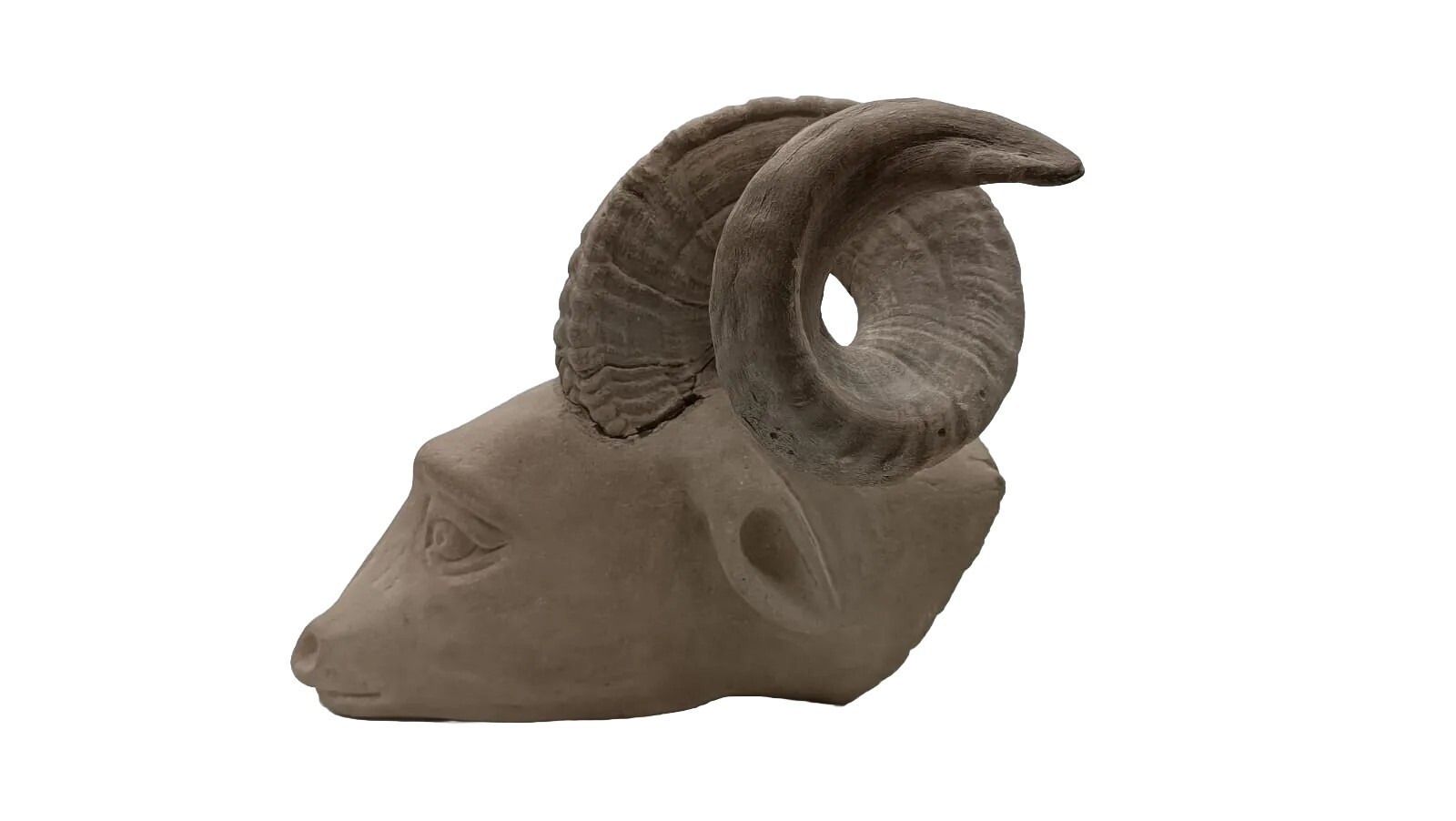 Sculpture In Stone Serena Carved Depicting Ram's Head photo furniture
