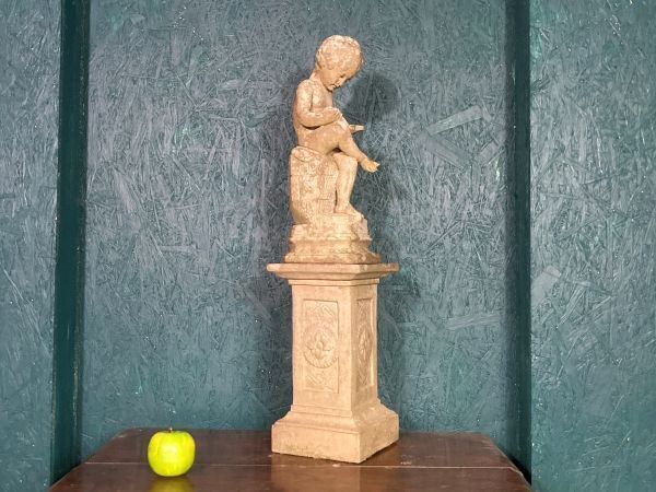 A Fine Petite Stoneware Sculpture Of A Seated Cherub photo 190.0