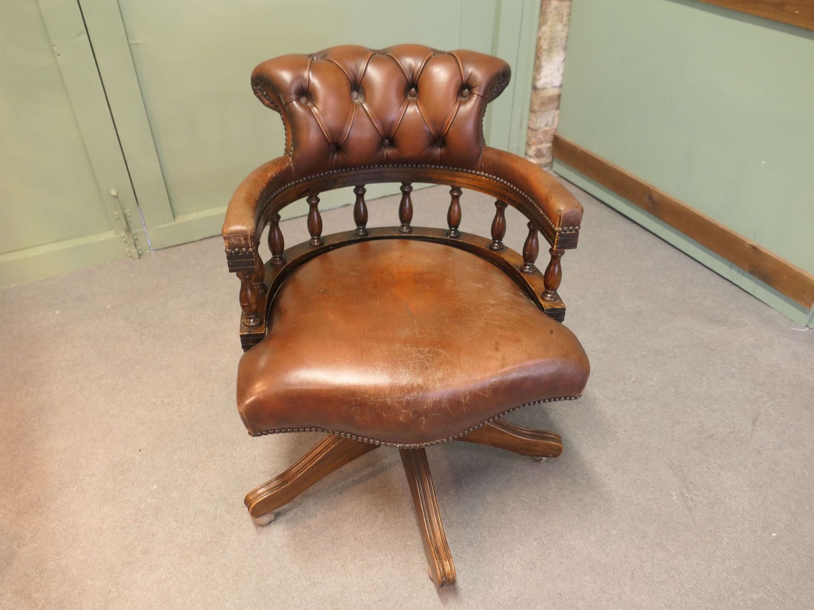 A Leather Hide Swivelling Desk Chair Or Captains Chair photo furniture