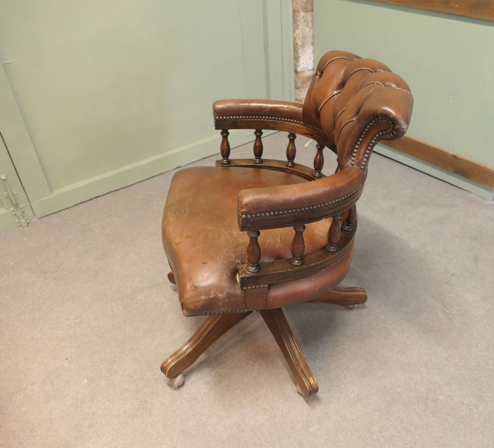 A Leather Hide Swivelling Desk Chair Or Captains Chair photo for sale