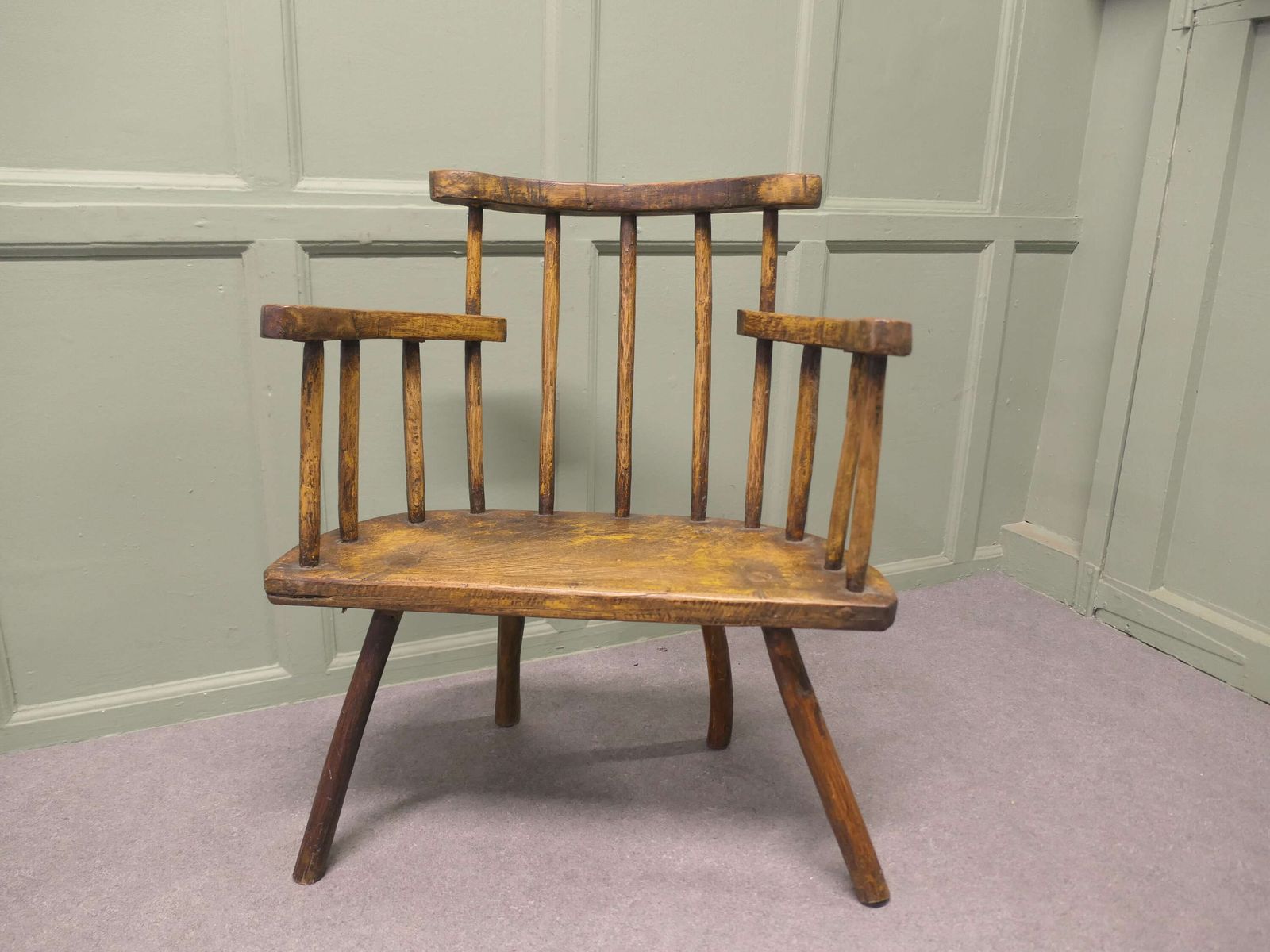 A Primitive 18th Century Country Comb Back Armchair photo for sale