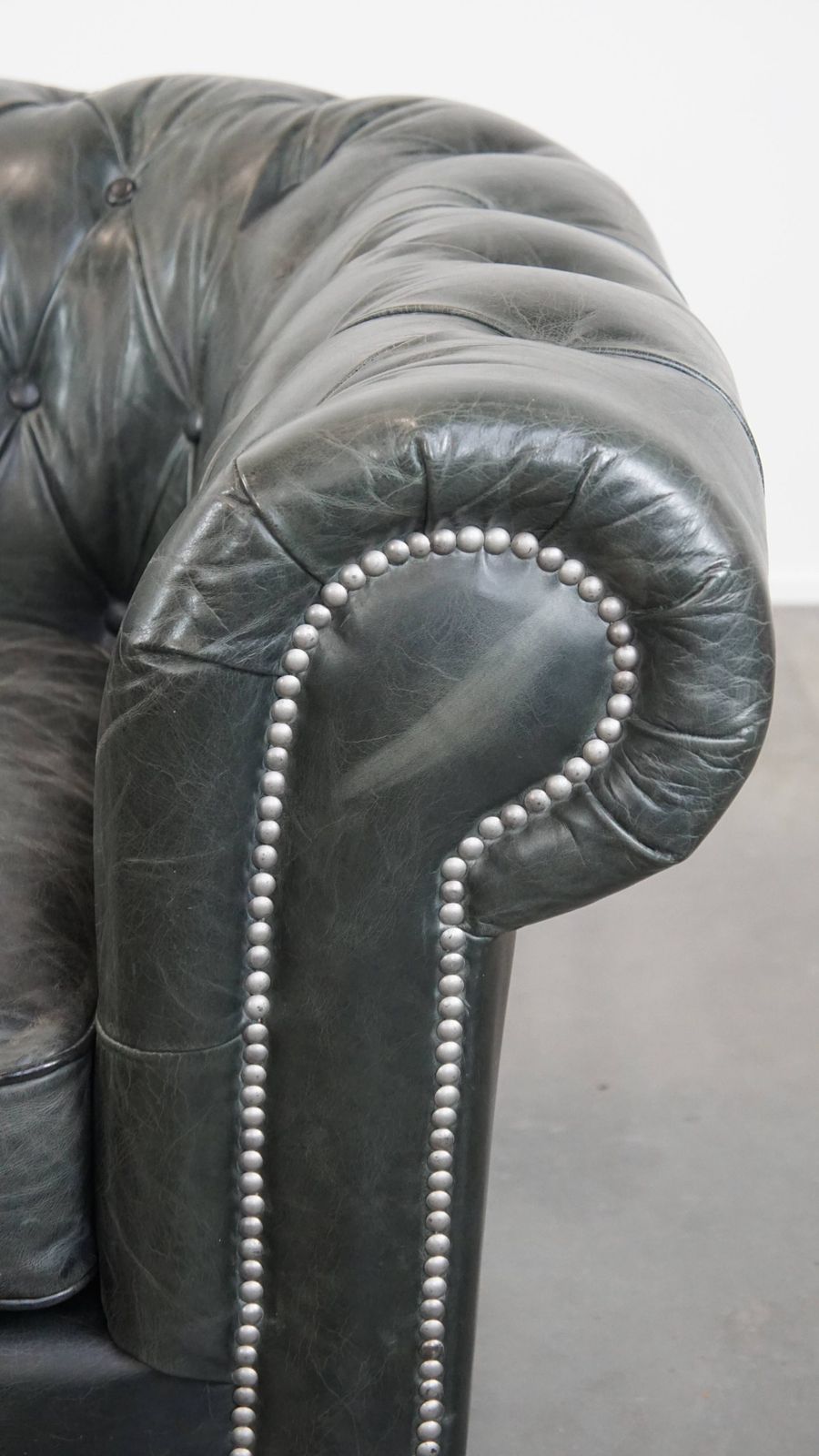 1017.0 Timeless And Classic Spacious Black Chesterfield Armchair Made Of Characterful Grained Cowhide photo