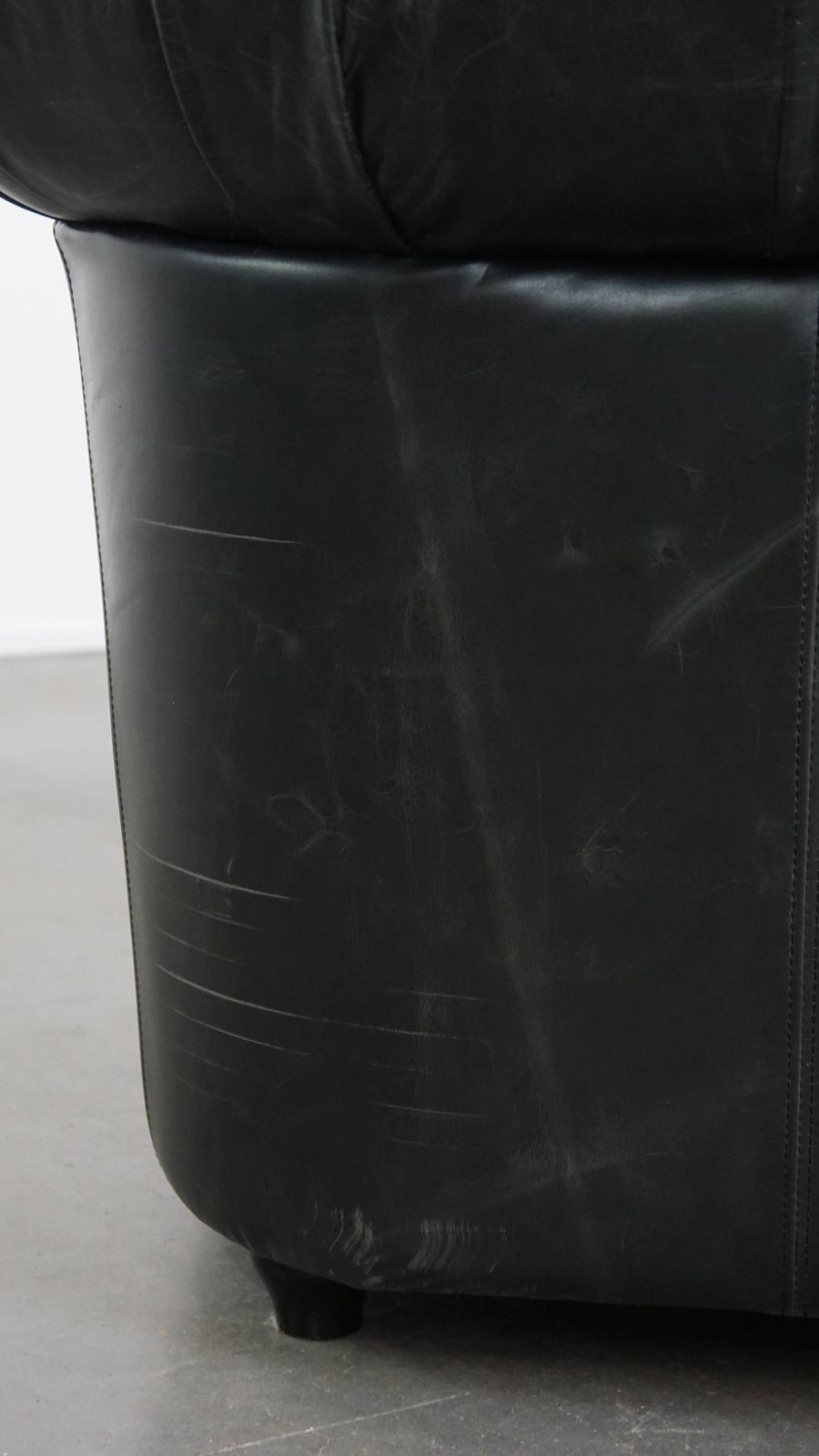 photo buy Timeless And Classic Spacious Black Chesterfield Armchair Made Of Characterful Grained Cowhide
