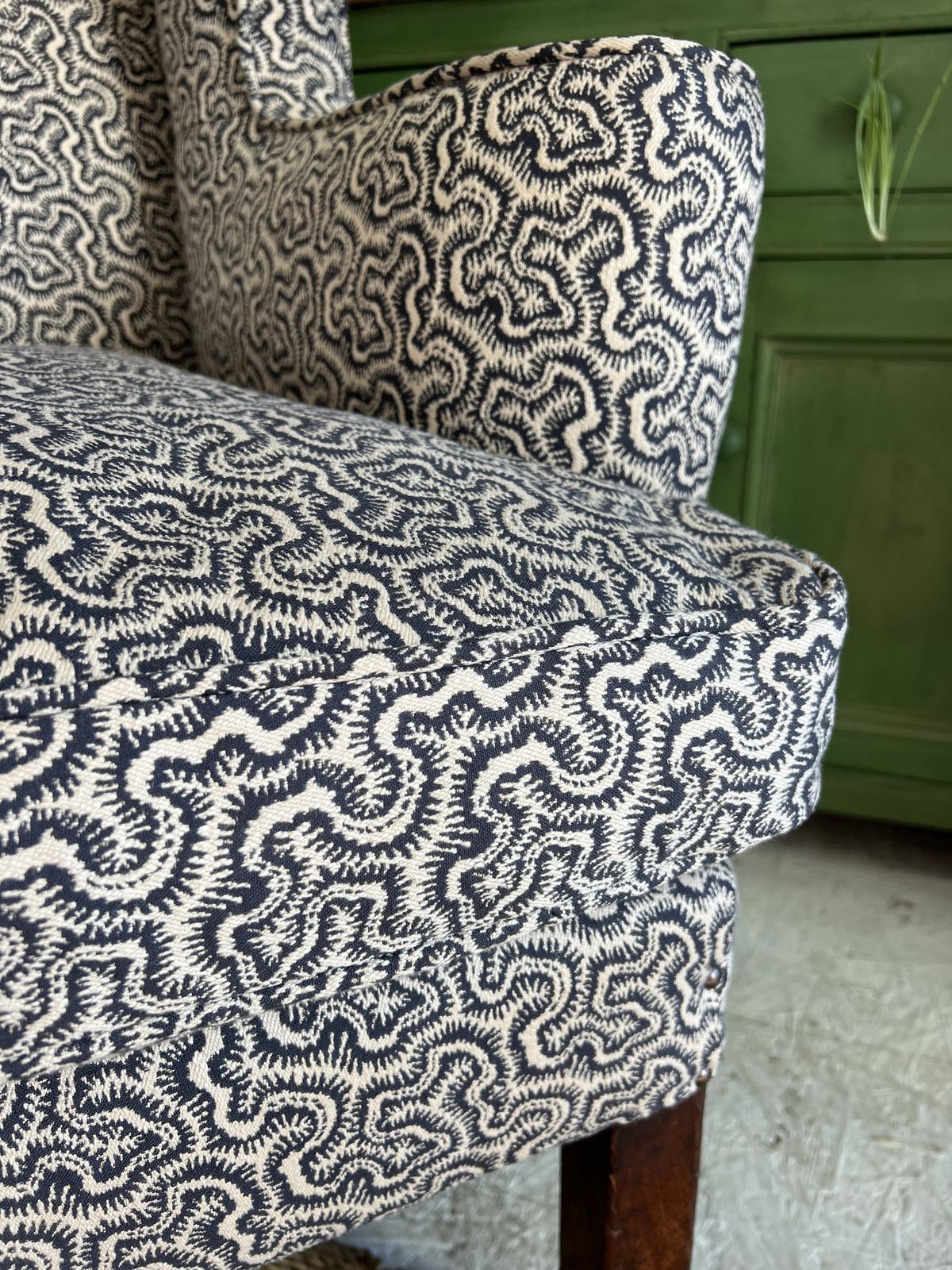 photo furniture Large Georgian Wingback Armchair, Traditionally Reupholstered In Squiggle/Seaweed Dark Blue & Natural Linwood Fabric.