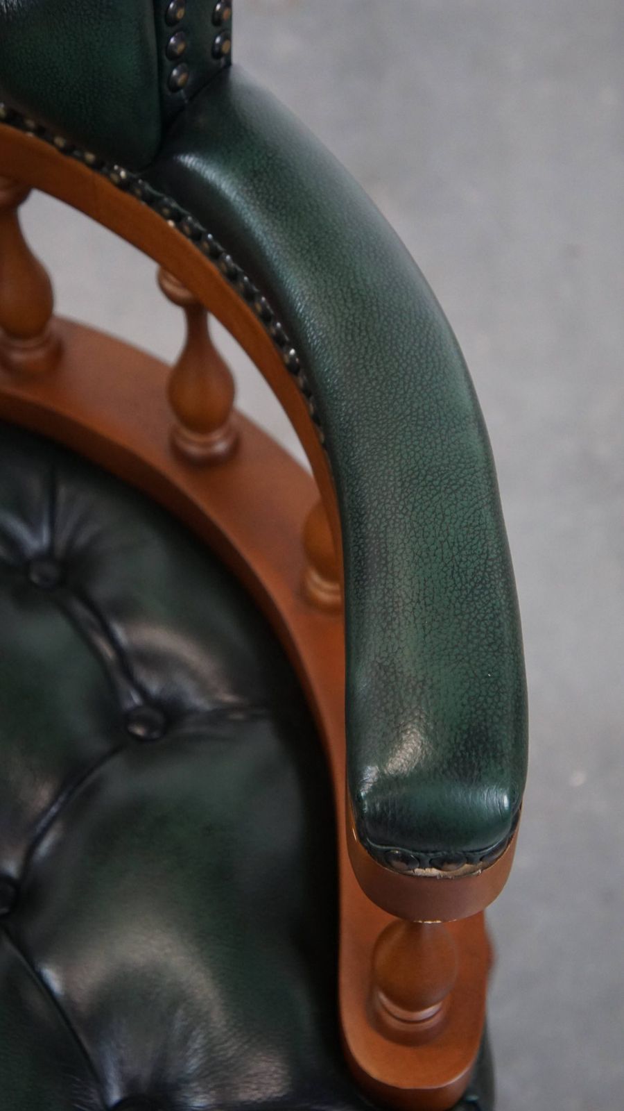 Stylish Functional Dark Green Chesterfield Office Chair In Cowhide Leather And Wood On Wheels photo vintage