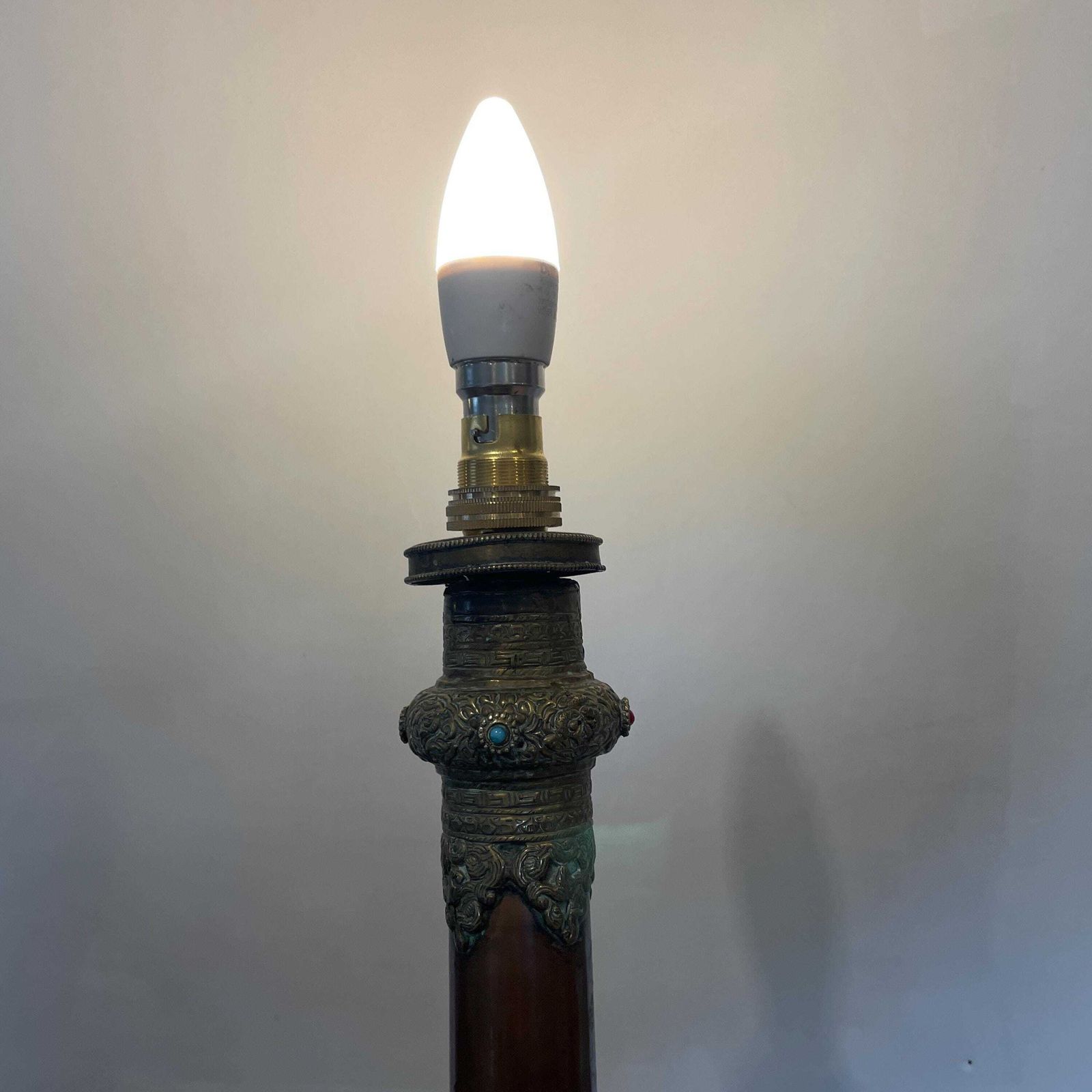 photo furniture Antique Brass Copper Floor Lamp Made From Tibetan Dungchen Horn Ornate Repoussé Detailing Nepalese Himalayan Handcrafted Ornamental Lighting