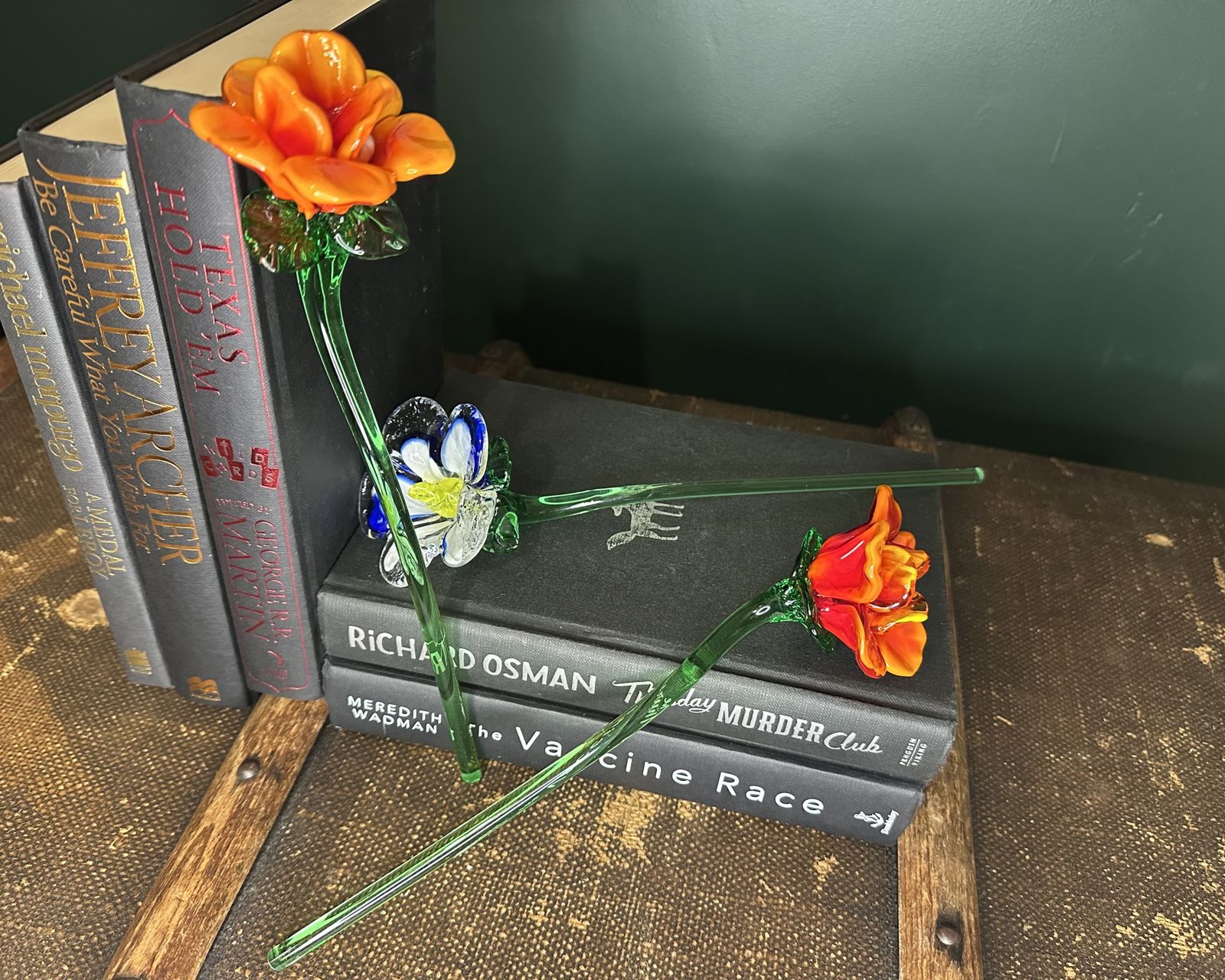 A Collection Of Colourful Mouth Blown Glass Flowers photo furniture