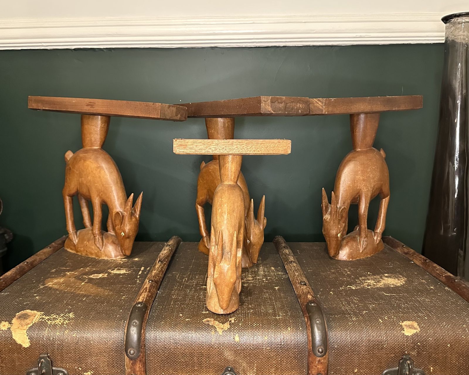 An Odd Collection Of Hand Carved Antelope Sculptures photo vinterior