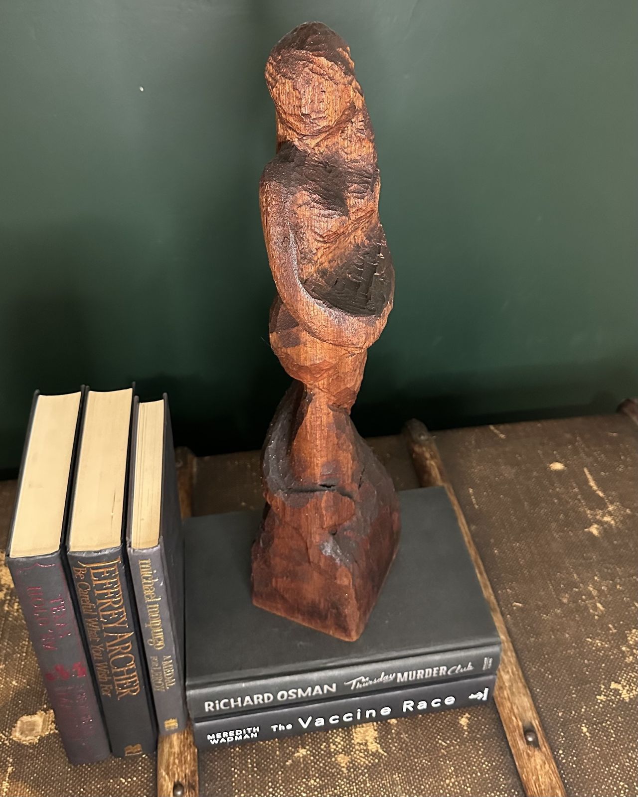 A Hand Carved Wooden Sculpture Depicting A Mermaid photo furniture
