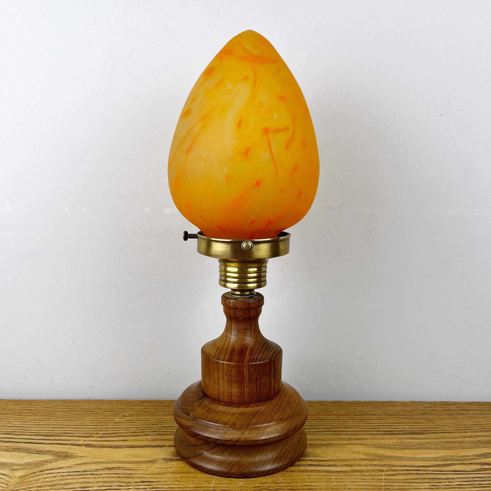 145.0 Art Nouveau Wooden Lamp With Orange Glass Teardrop Shade. photo