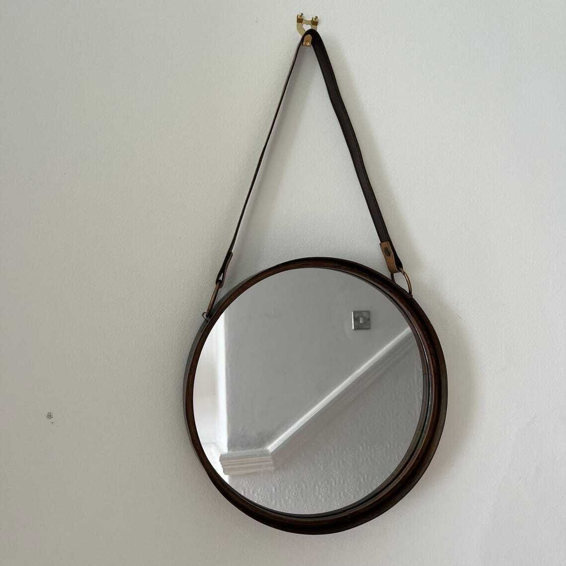 A Pair Of Wall Hanging Circular Metal Framed Mirror With Hanging Strap photo for sale