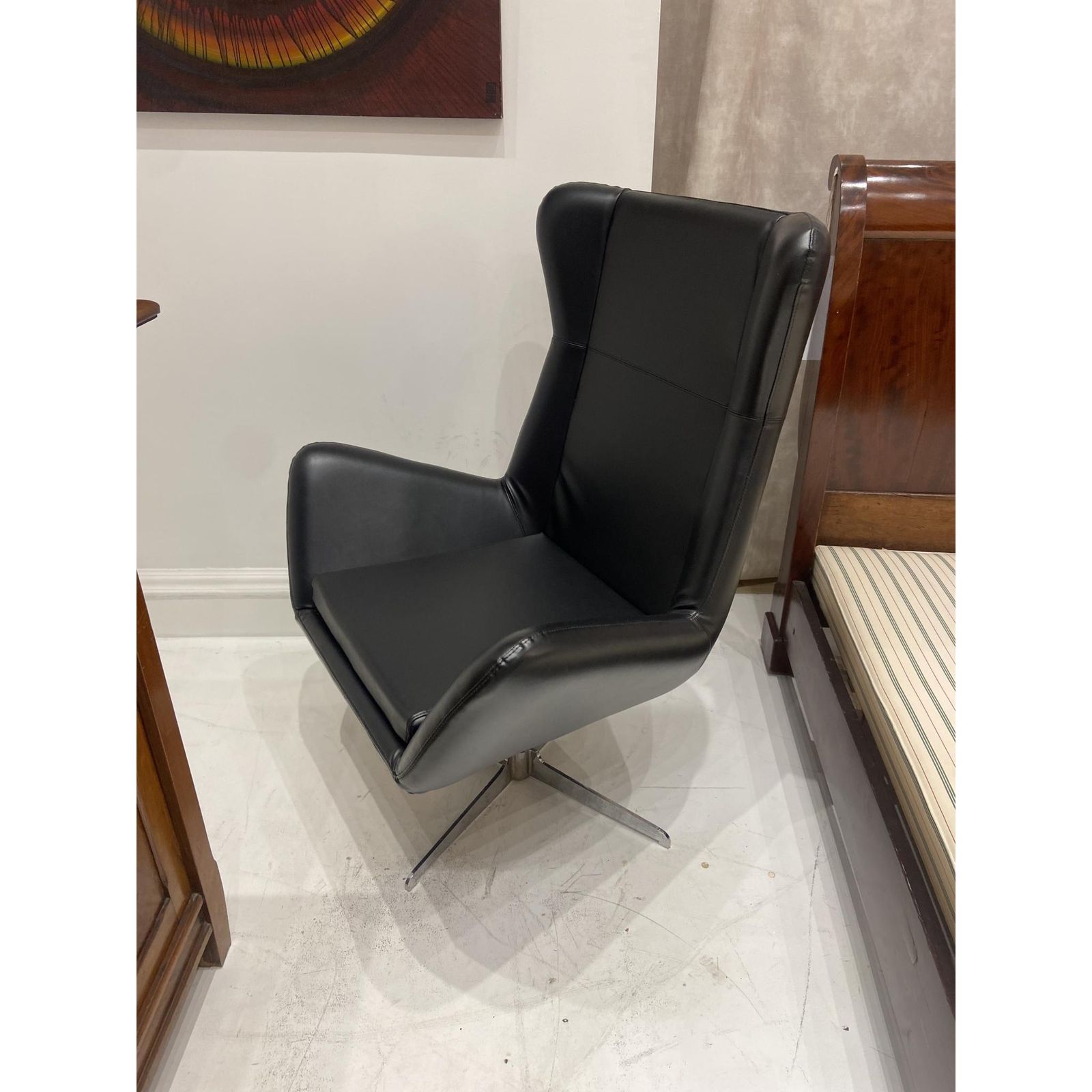 Vintage Black Leather Swivel Lounge Chair With Chrome Base photo for sale
