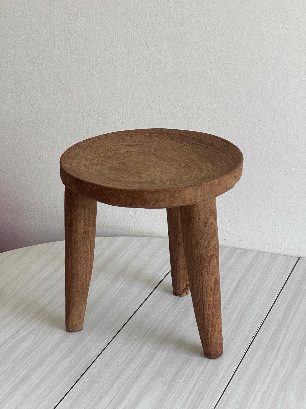 Small Old Stool In Raw Wood Carved From A Single Trunk, Natural And Vintage Decor, Authentic And Rustic Occasional Bench photo furniture