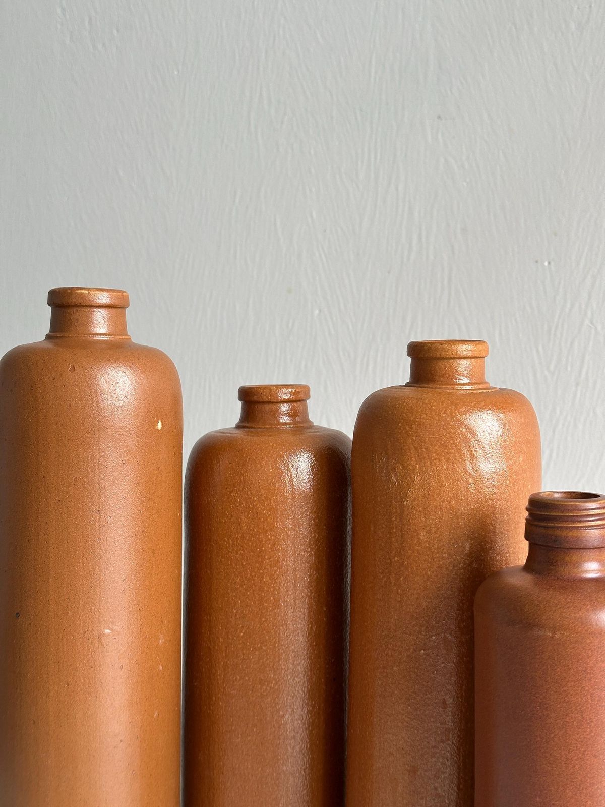 Set Of Old Stoneware Bottles, Brutalism Decoration, Minimalist Design, Creative Studio Interior, Retro Object, Wedding Decor photo furniture