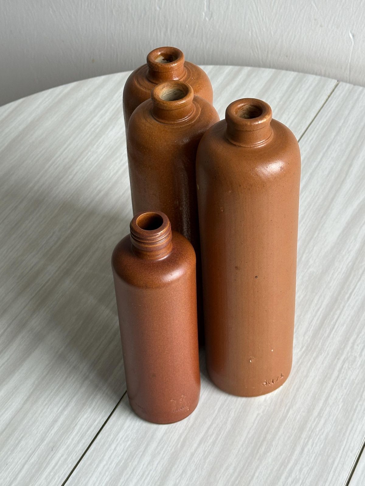 photo furniture Set Of Old Stoneware Bottles, Brutalism Decoration, Minimalist Design, Creative Studio Interior, Retro Object, Wedding Decor