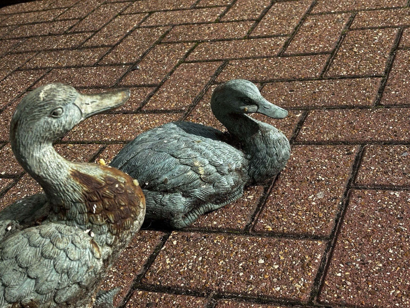 Pair Of Metal Garden Ducks With Aged Verdigris photo for sale