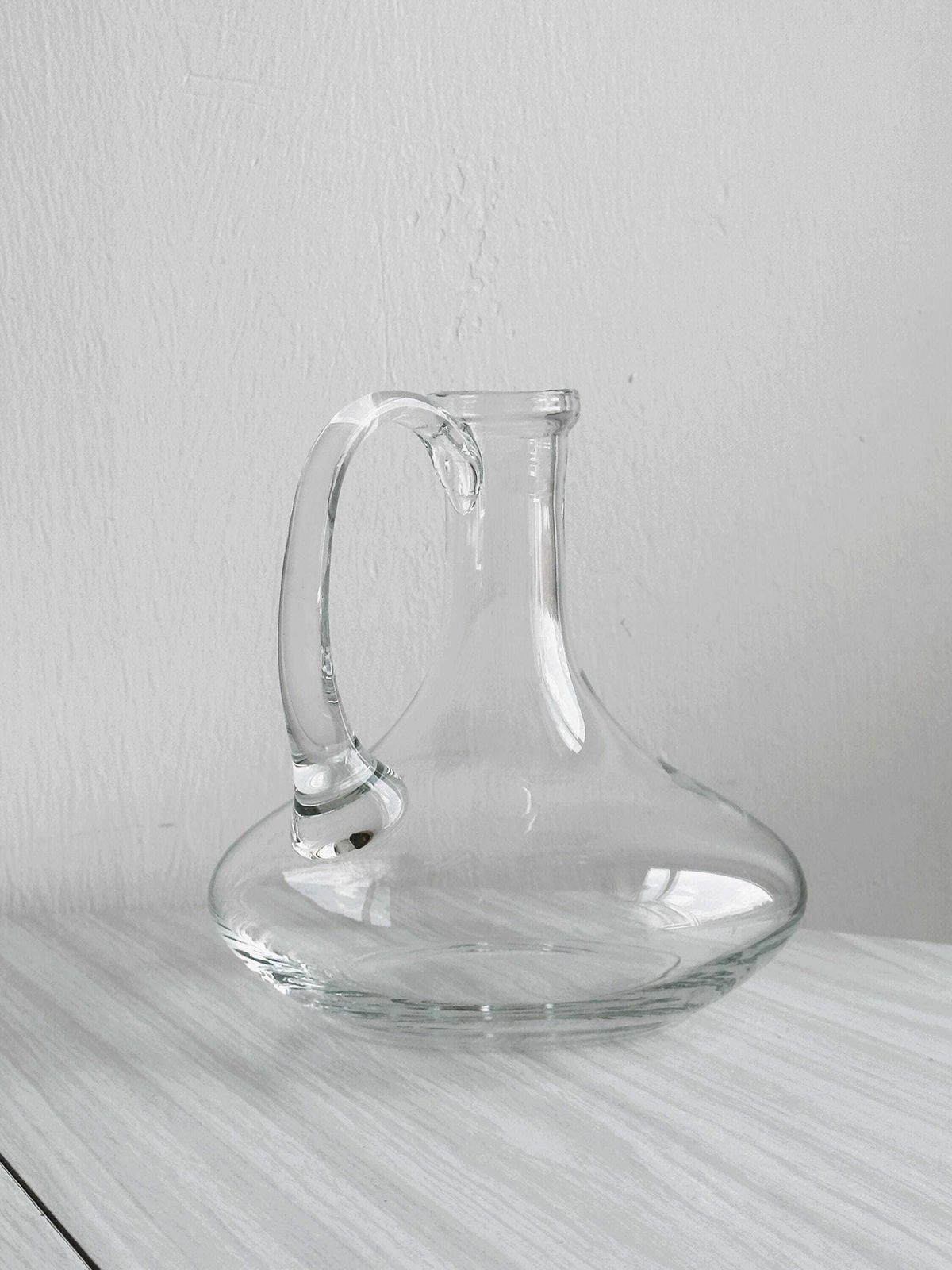 photo furniture Mouth Blown Glass Carafe, Elegant Design, Unique Craft Piece, Refined Table Decoration, Decanter, Wine Carafe
