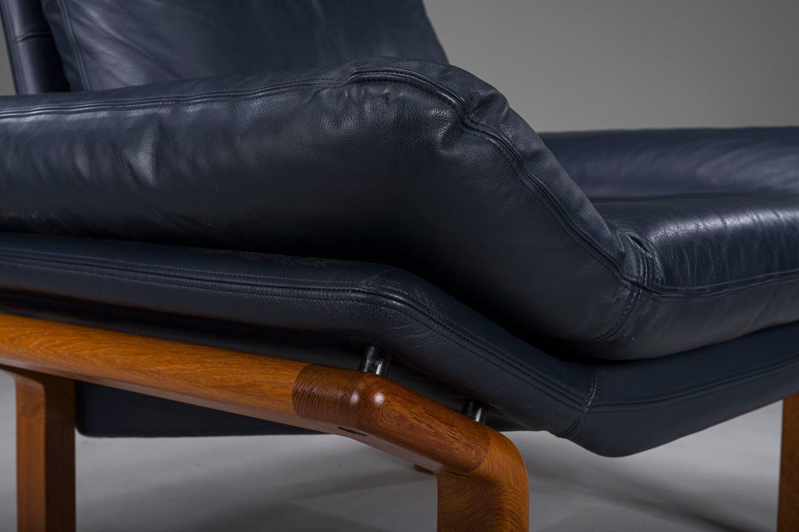 photo for sale Danish Teak And Navy Blue Leather Lounge Chair From Komfort, 1970s