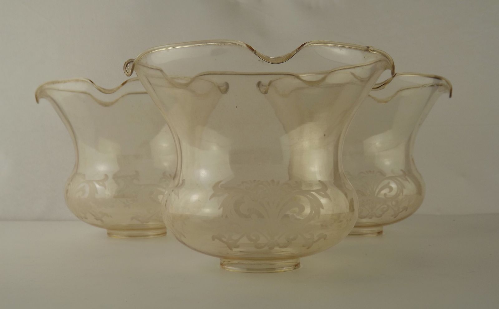 Set Of 3 Vintage Glass Bell Shades In Smoked Amber Glass With Scroll Motif And Frilled Edge photo furniture