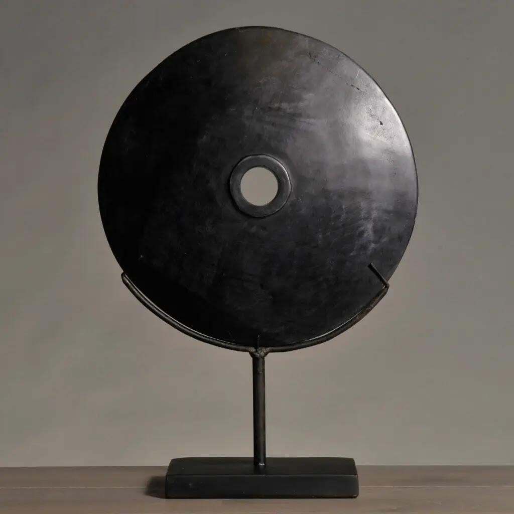 Papuan Black Stone Disc Sculpture – Ethnic Ritual Art, Contemporary photo furniture