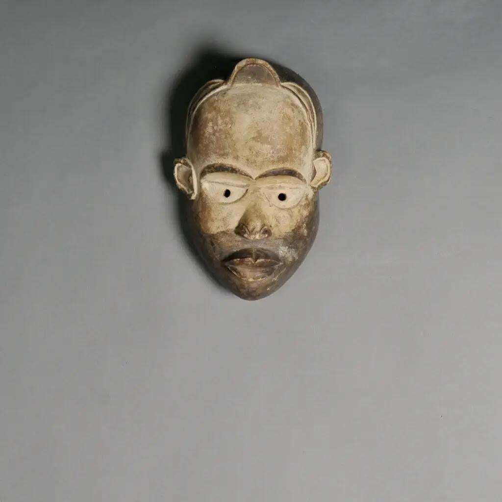 Expressive Tribal Congo Mask In Patinated Wood – Figurative African Art photo furniture