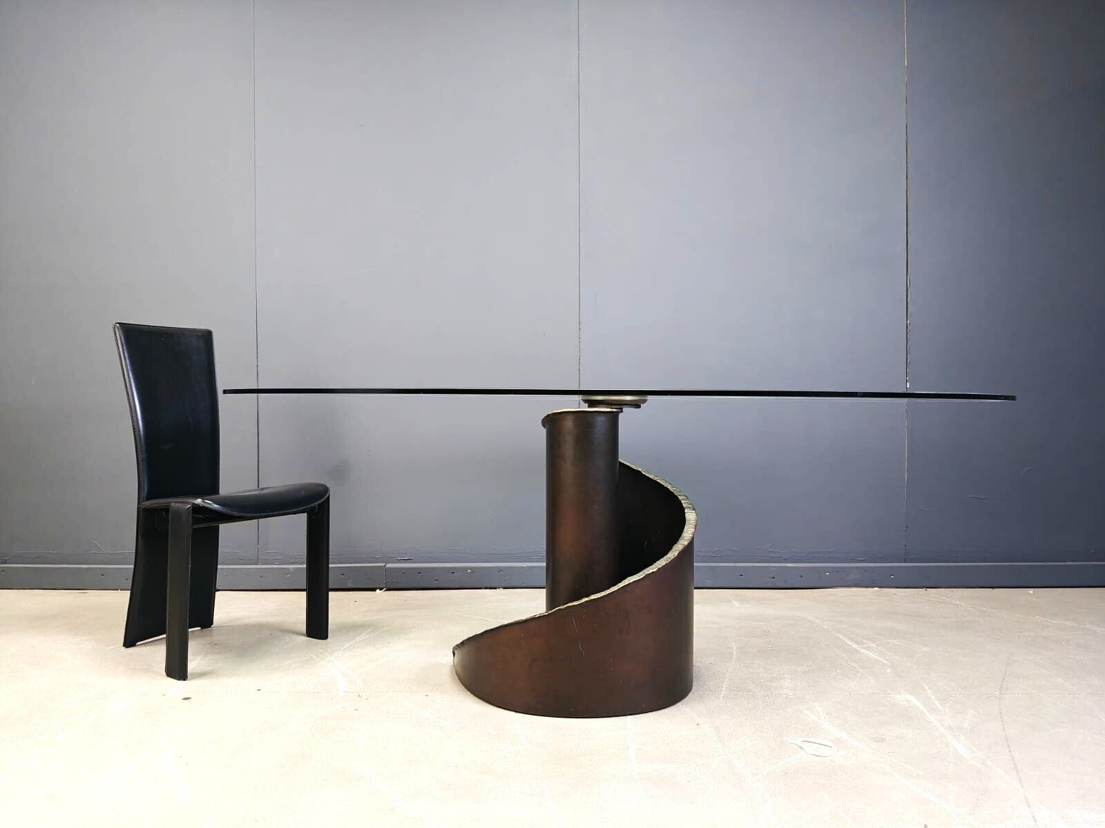 photo furniture 1990s Brutalist Style Glass And Bronze Dining Table By Barilone For Roche Bobois