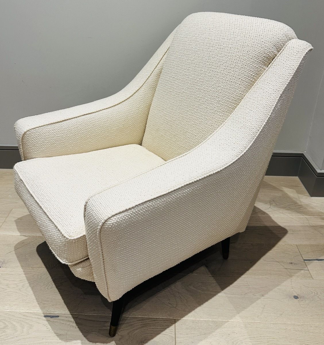 photo furniture Pair Of 1950s French Cream Boucle & Brass Legs Lounge Armchairs