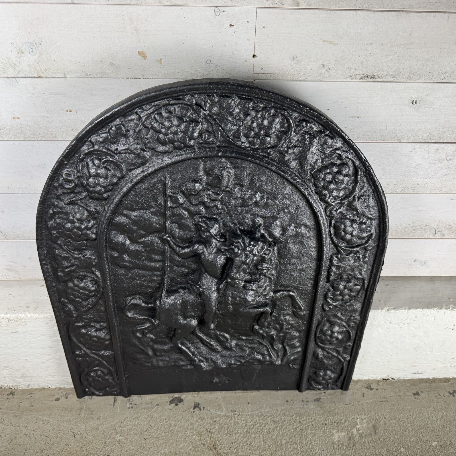 Antique Cast Iron Fire Back Depicting A Soldier On Horseback photo vinterior