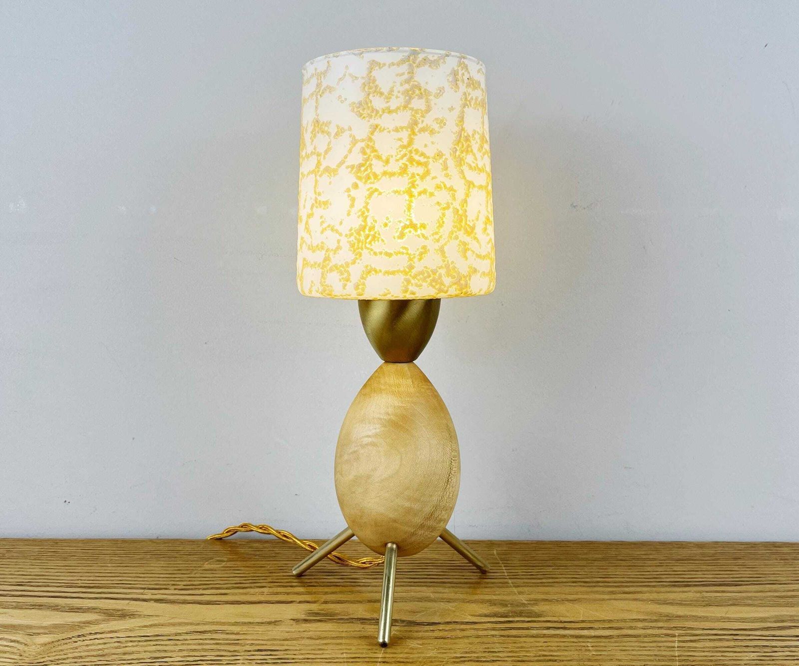 Vintage Atomic Wooden Tripod Lamp With White & Gold Glass Shade.