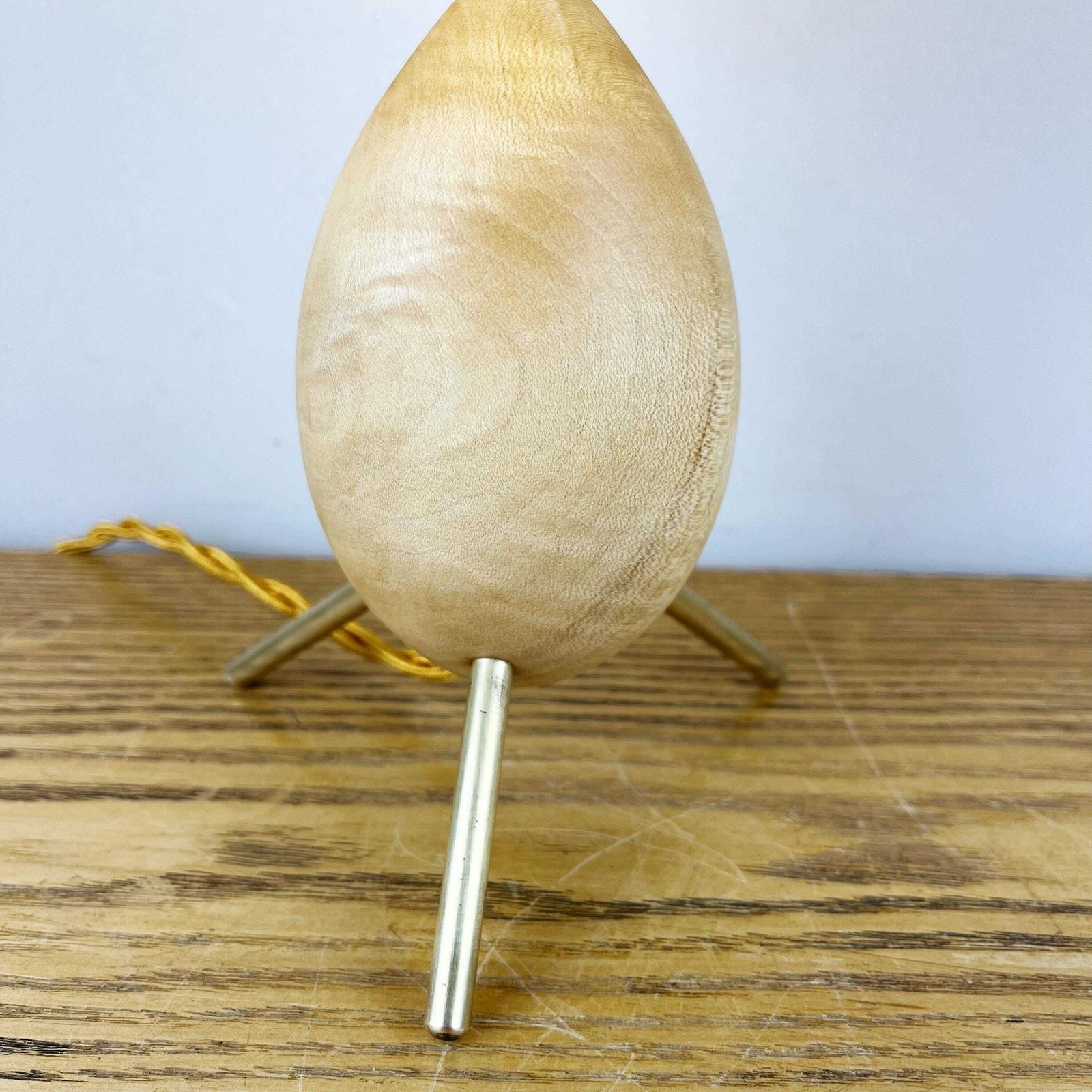 110.0 Vintage Atomic Wooden Tripod Lamp With White & Gold Glass Shade. photo