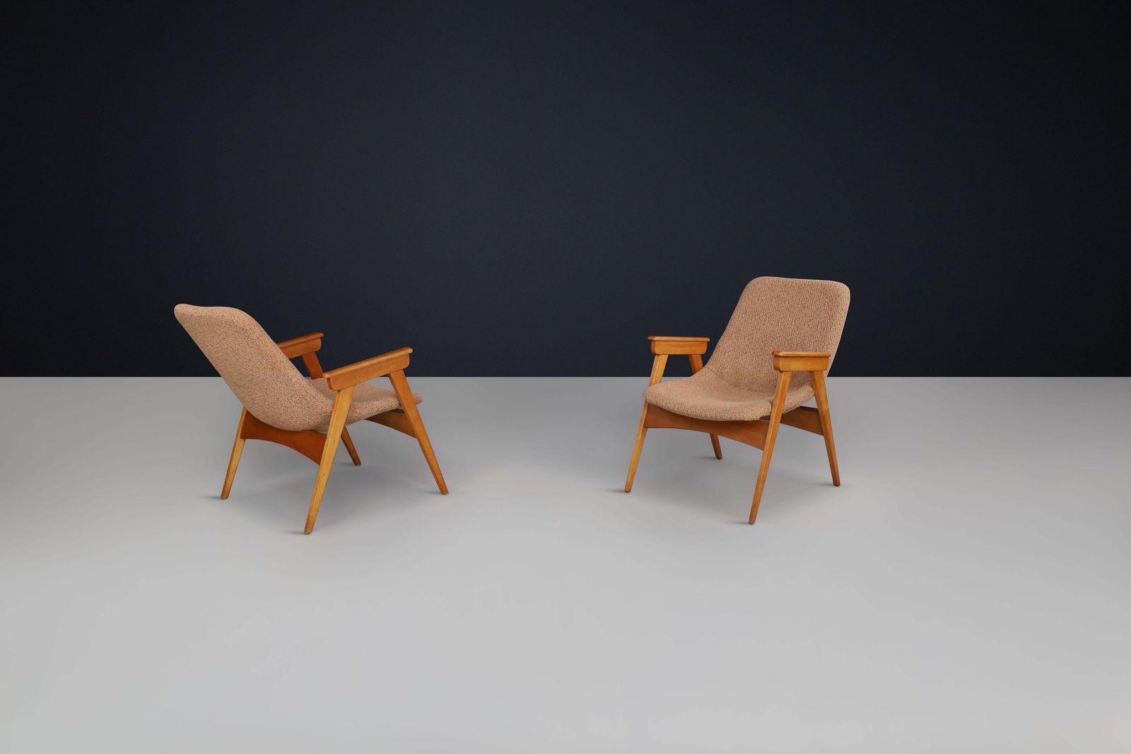 photo furniture Pair Of 1950s European Beech & Fiberglass Lounge Chairs – Mid Century Modern