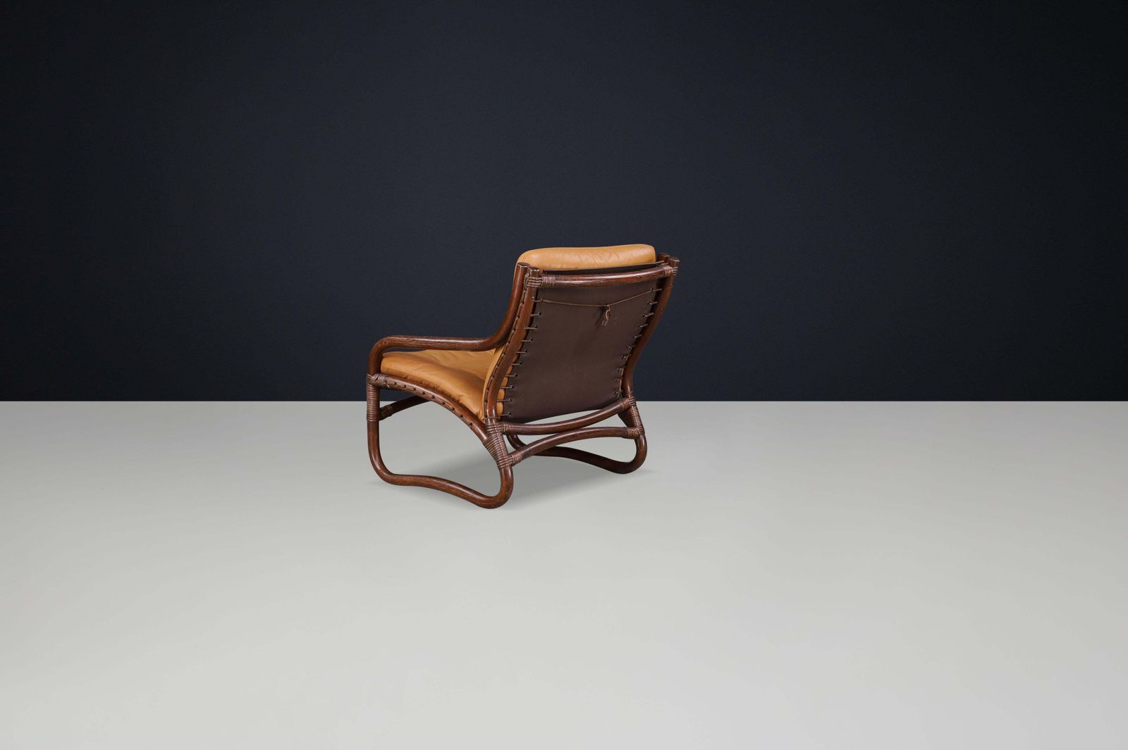 photo furniture “Ecco” Easy Chair By Slettvoll In Cognac Leather And Rattan, Norway 1970s