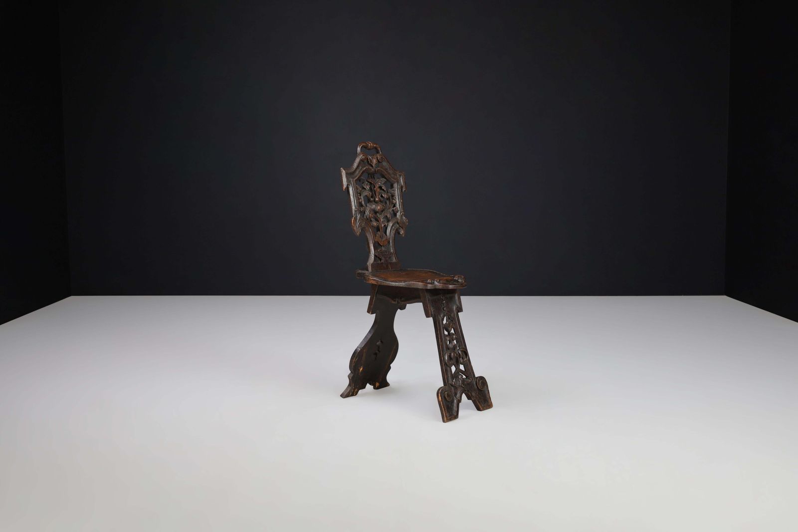 photo furniture Antique Pair Of Figural Heavily Carved Oak Sgabello Chairs Italy
