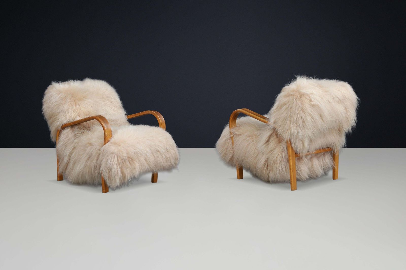 Patinated Bentwood Lounge Chairs By Kozelka & Kropáček In Long Haired Icelandic. photo vinterior