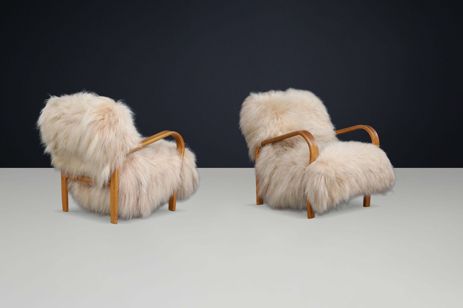 Furniture Patinated Bentwood Lounge Chairs By Kozelka & Kropáček In Long Haired Icelandic. photo