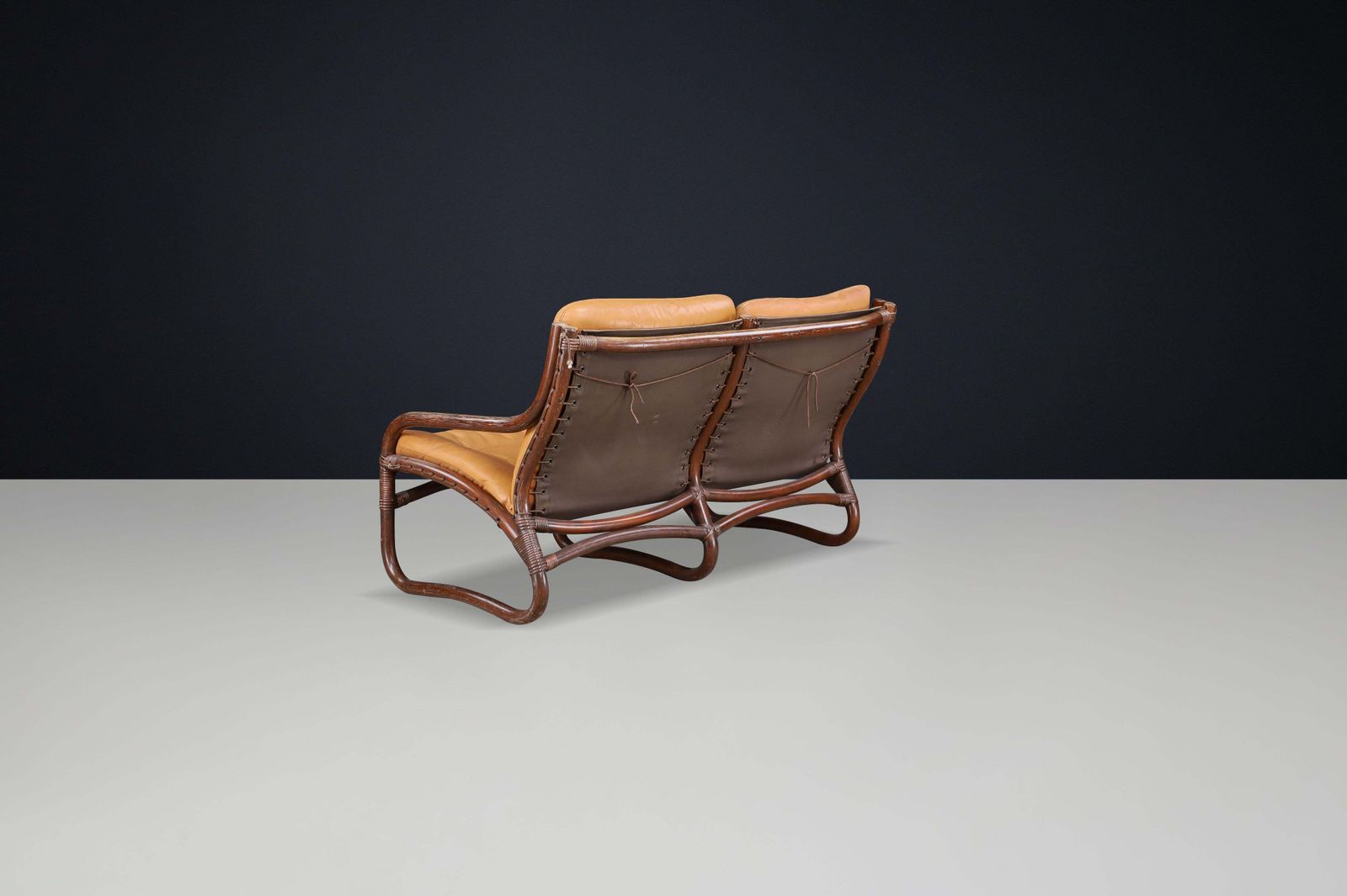 photo furniture Two Seat “Ecco” Loveseat By Slettvoll In Cognac Leather And Rattan, Norway 1970s