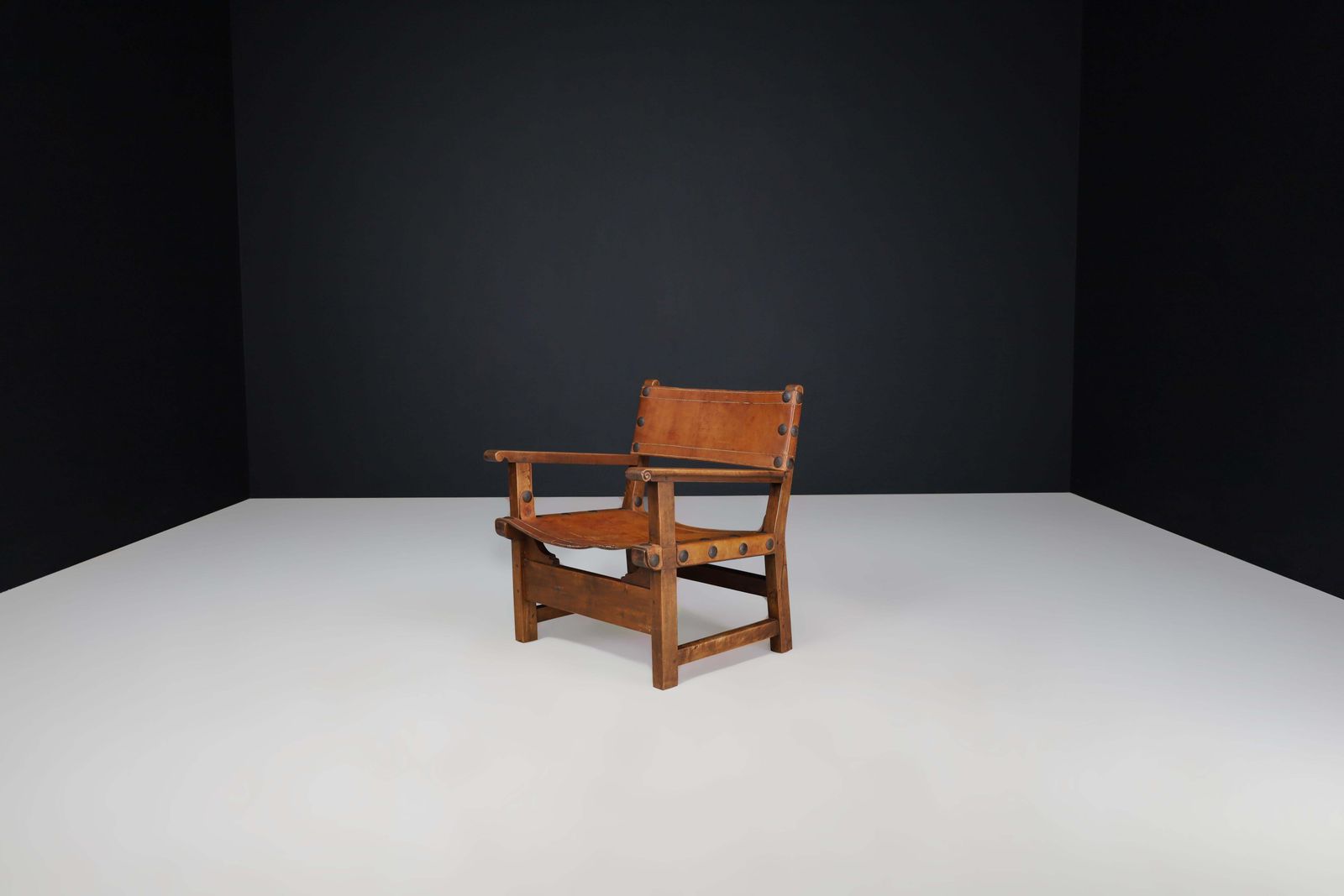 Patinated Wood And Cognac Leather "Spanish Chair" Spain, 1960s photo for sale