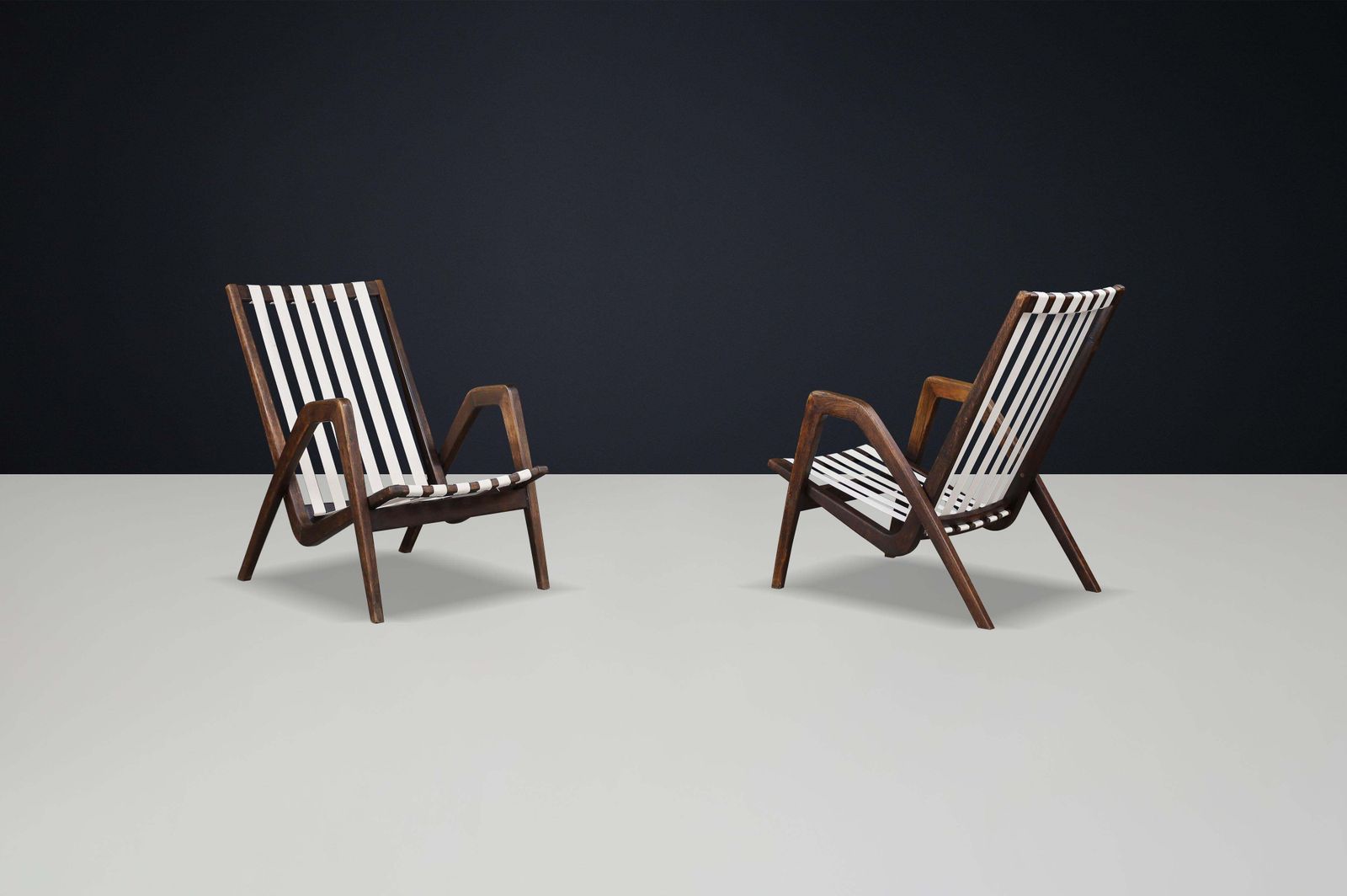 photo furniture Rare Pair Of Jan Vaněk Sculptural Oak Lounge Chairs, 1940s Czech Modernism