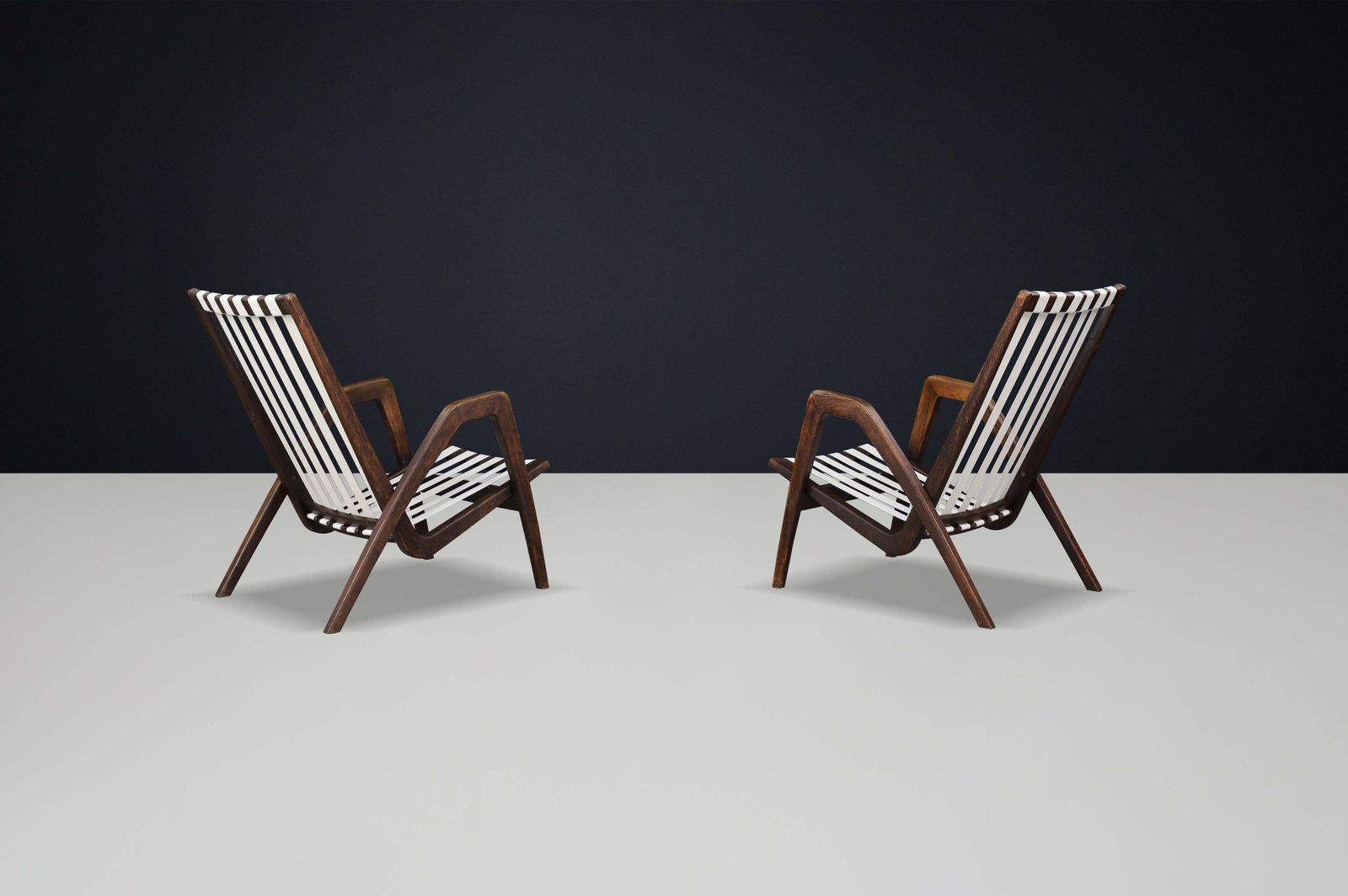 photo for sale Rare Pair Of Jan Vaněk Sculptural Oak Lounge Chairs, 1940s Czech Modernism
