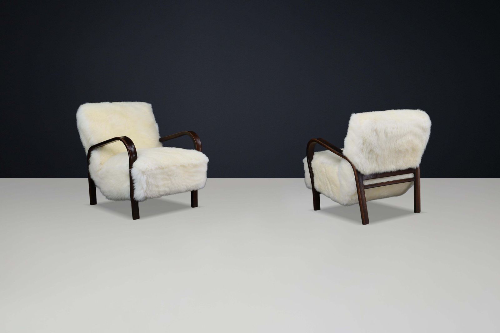 photo for sale 1940s Kozelka & Kropacek Armchairs In Ivory Texel Sheepskin Dark Patinated Frame