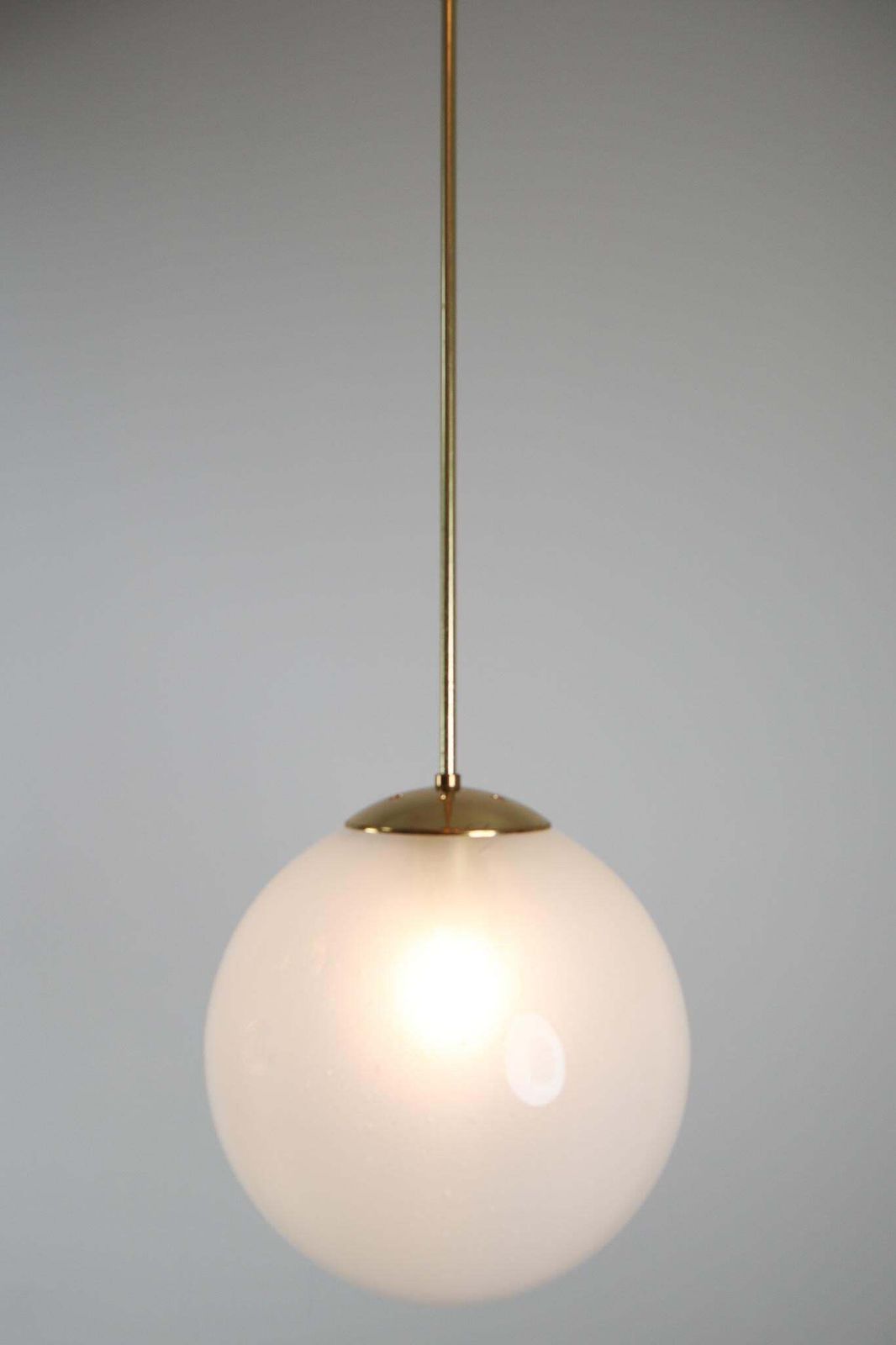 Large Brass Pendant With A Pearl White Hand Blown Globe By Preciosa, 1970s photo for sale