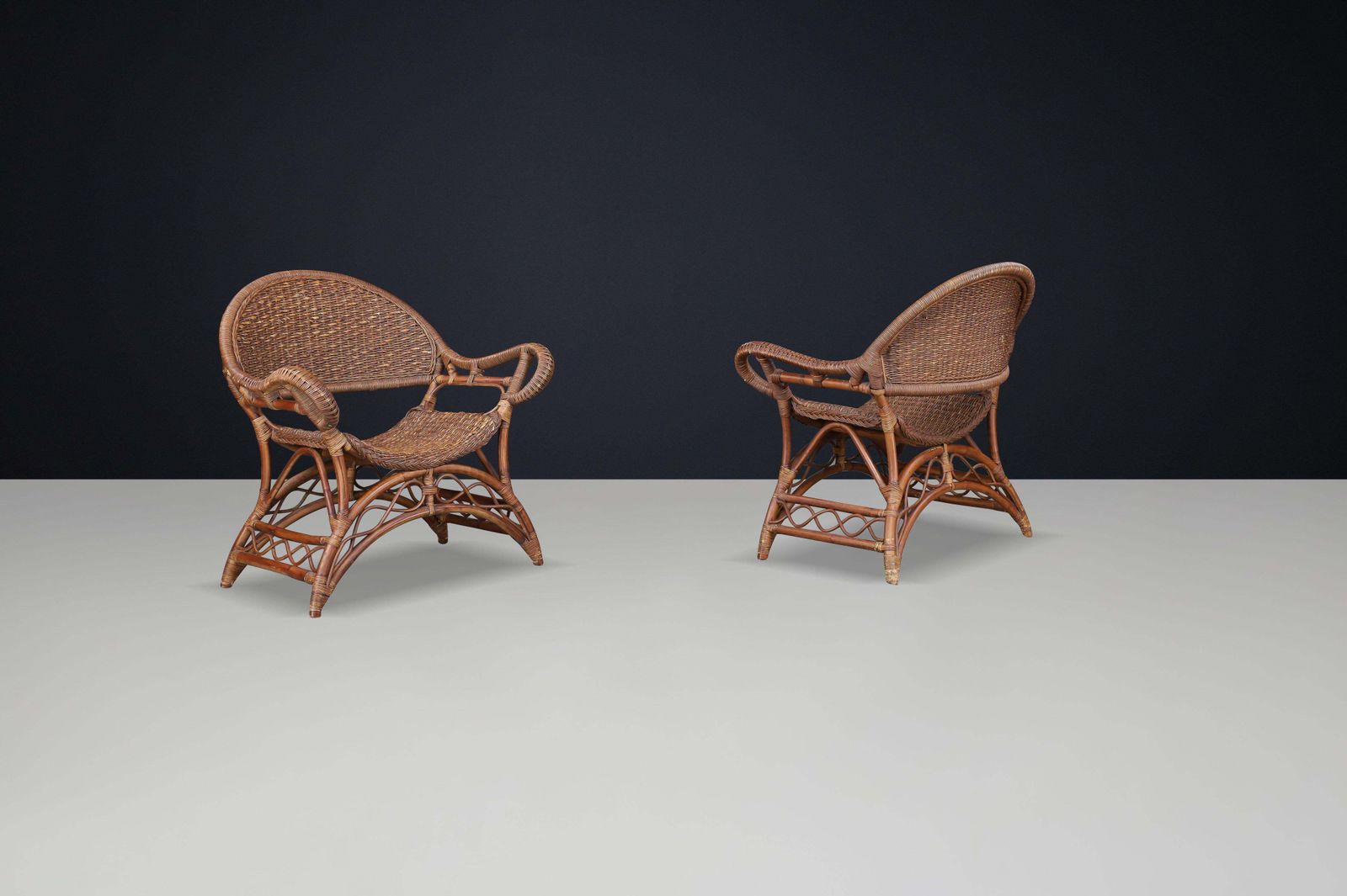 Set Of Two Sculptural Rattan And Bamboo Lounge Chairs, Spain, 1960s photo vintage