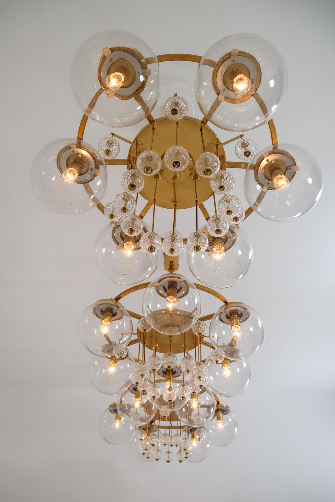 photo furniture Hotel Chandelier, In Brass And Glass, Austria 1950s