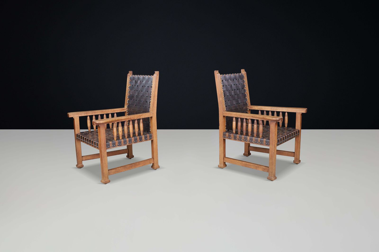 A Pair Of Leather And Oak Armchairs From France, 1950s. photo for sale