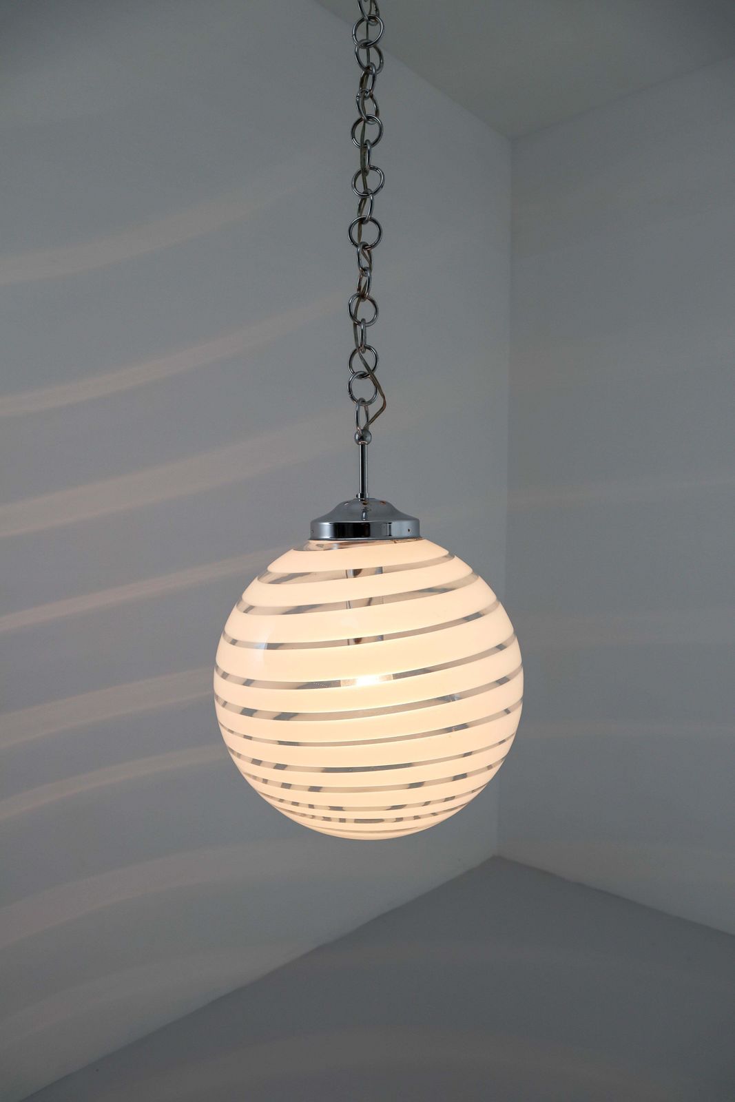 photo for sale Midcentury Pendant In Chrome And Art Glass With White Streaks, Germany, 1970s